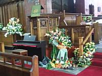 The pulpit decorated for Harvest Festival